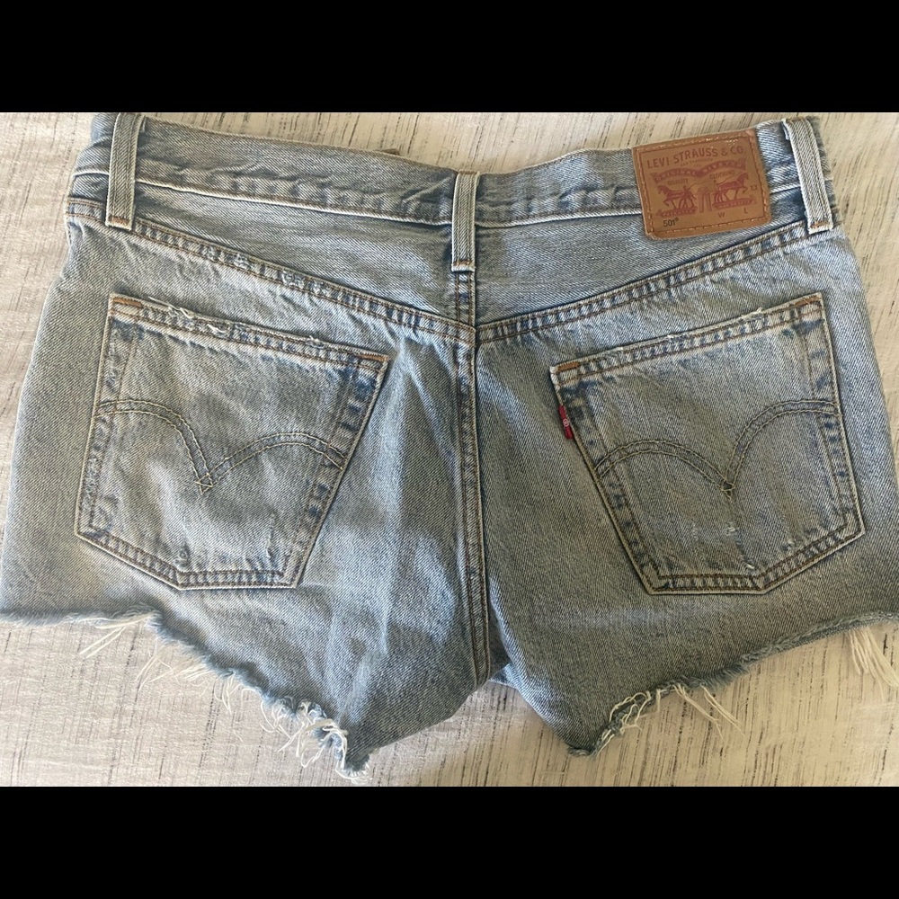 2 pairs size 28 Levi’s 501 cut offs